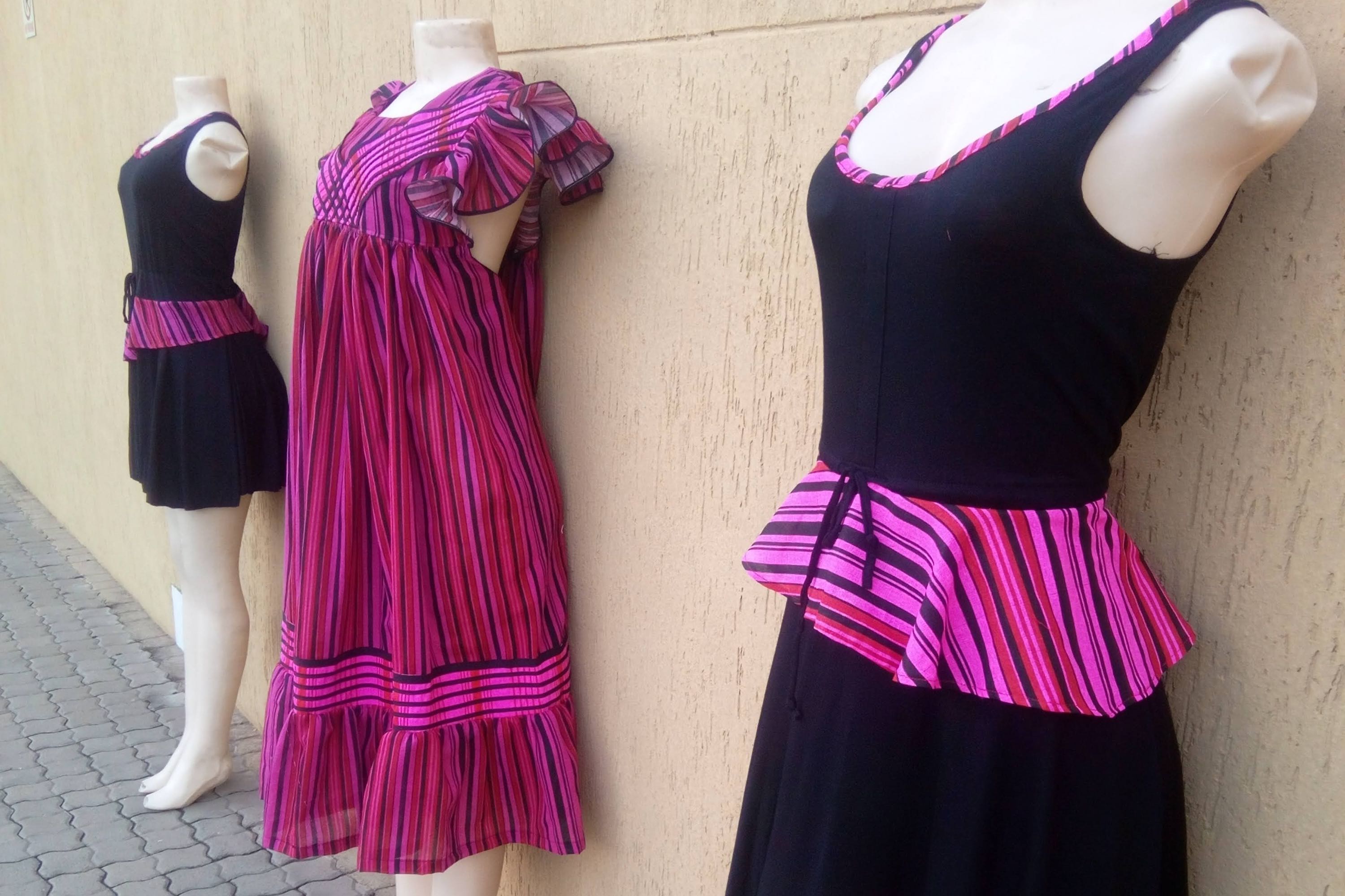 A selection of three dresses.
